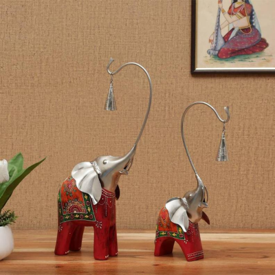 OPPERSTE ARTISAN CRAFTED
WOODEN ELEPHANT
WITH BELL FIGURINE